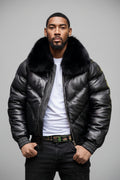 Man wearing a black goose country leather jacket with fox fur collar