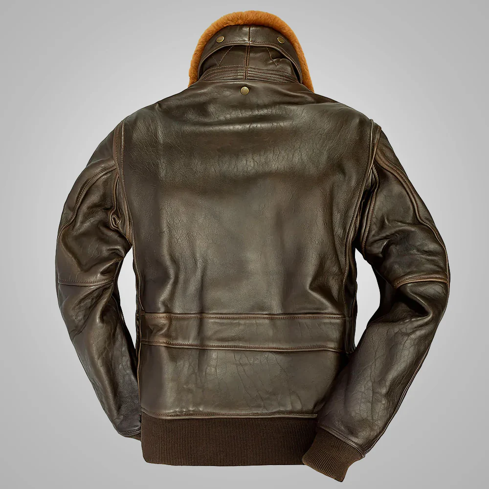 Brown leather jacket with fur-lined hood on a gray background