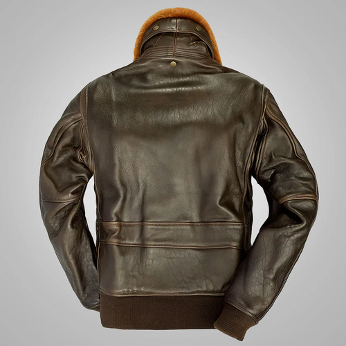 Brown leather jacket with fur-lined hood on a gray background