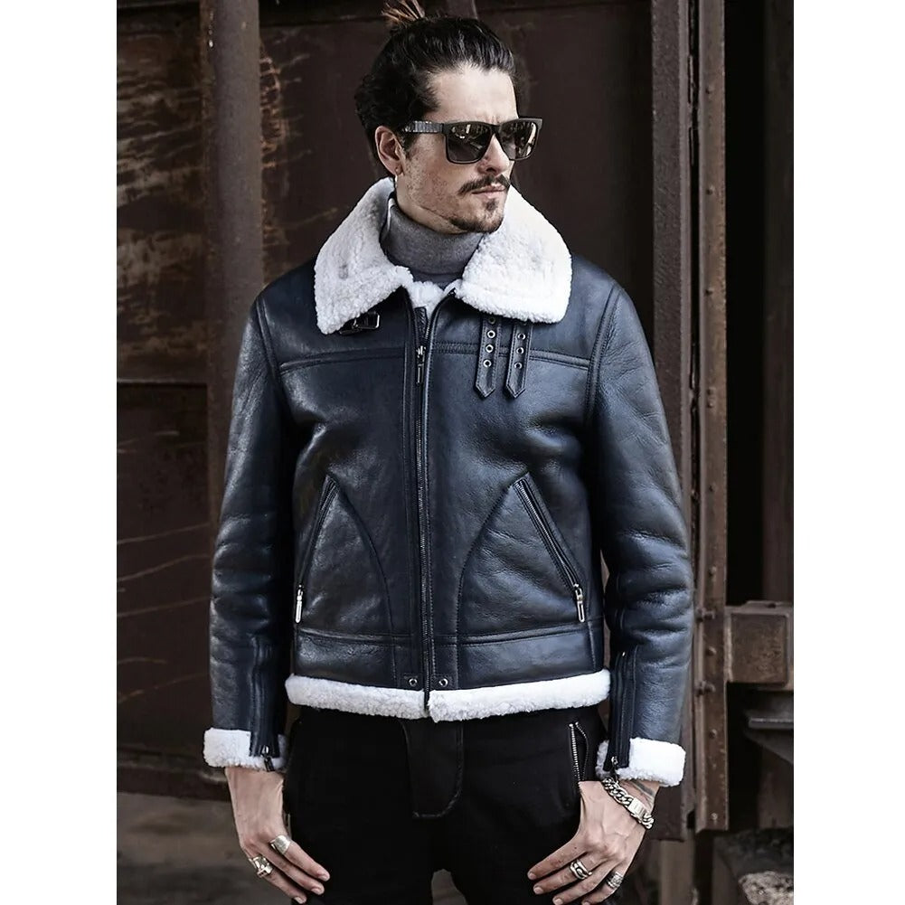 Man wearing a black leather jacket with white fur lining in an urban setting