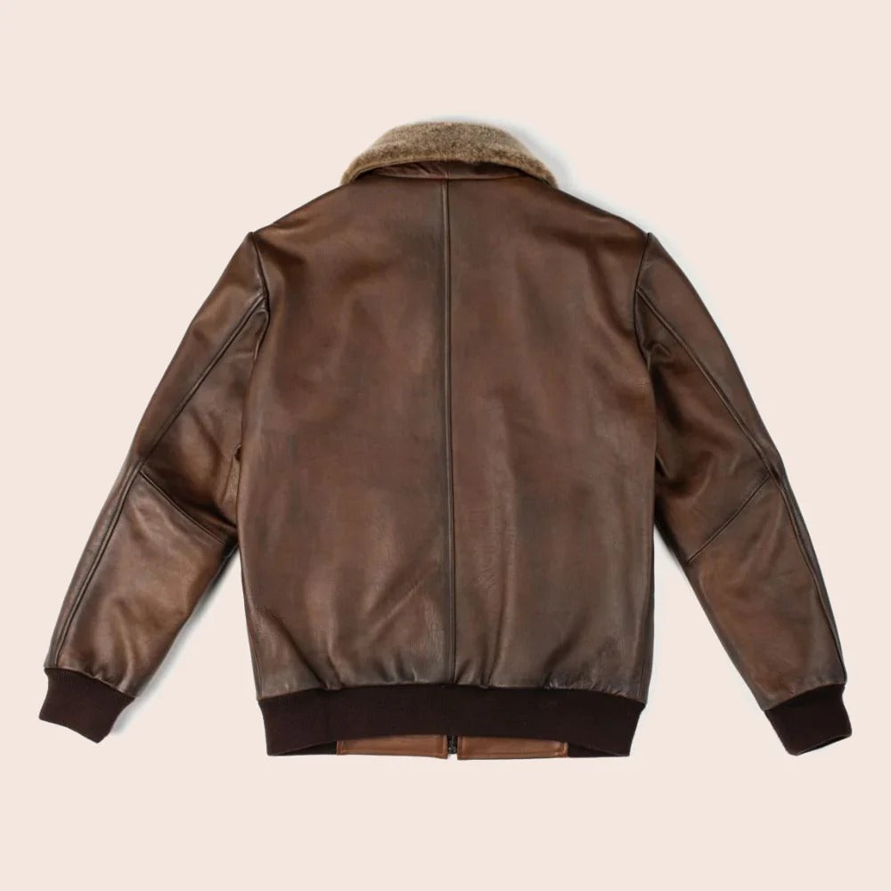 A brown leather jacket with a tan faux-fur collar, shown from the back against a light beige background.