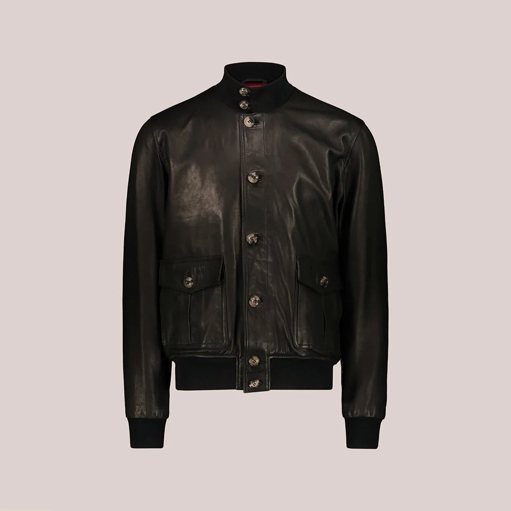 Black leather jacket on a beige background