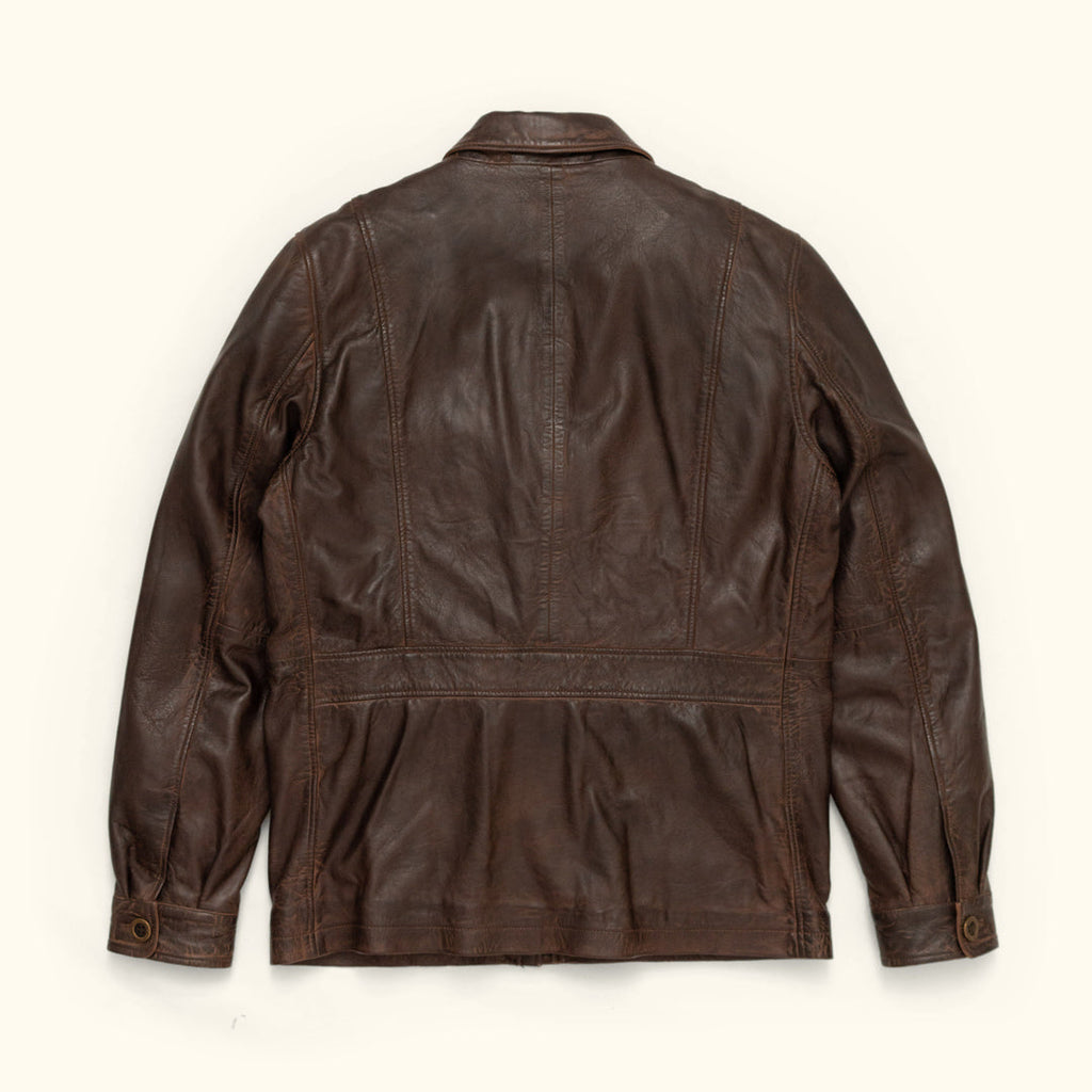 Brown leather jacket on a white background