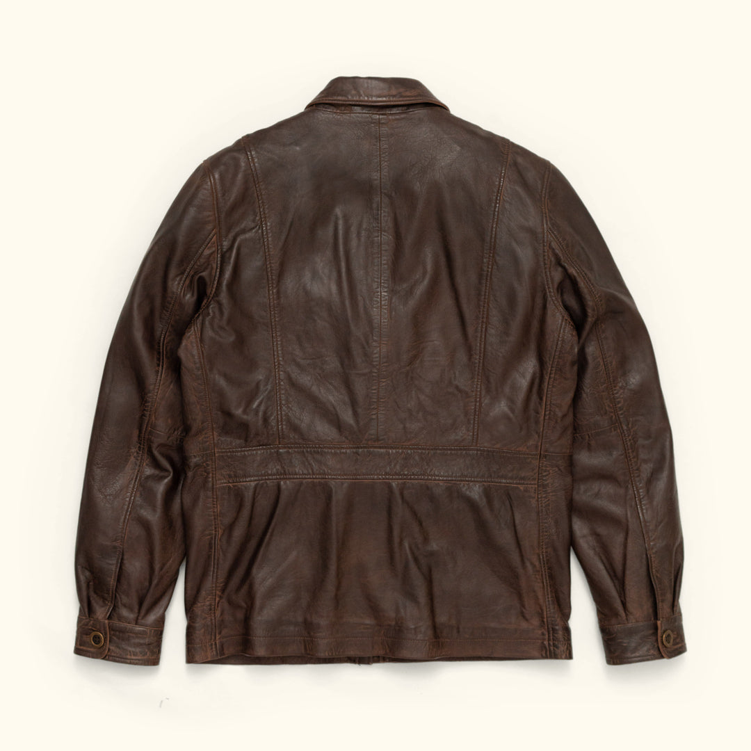 Brown leather jacket on a white background