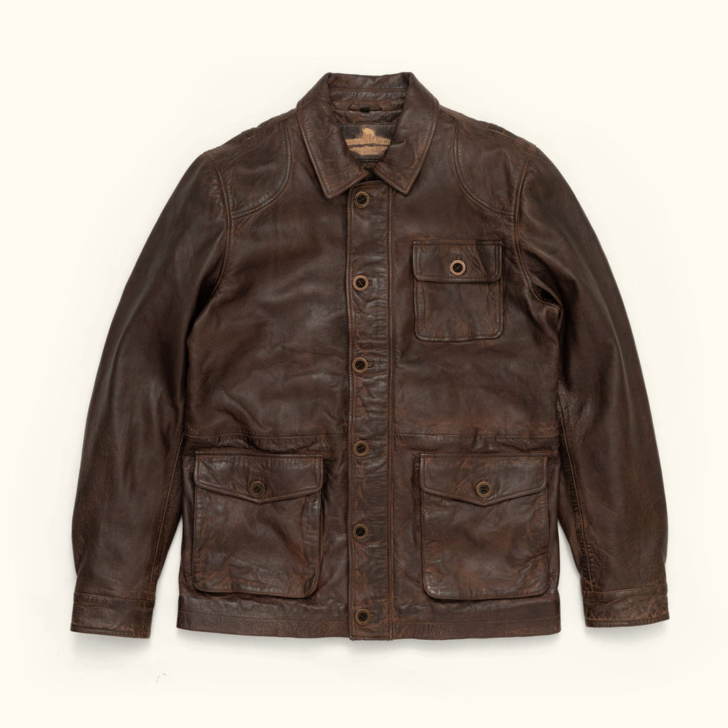 Brown leather jacket on a white background
