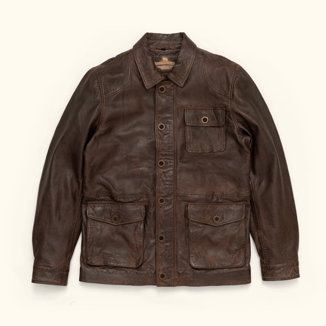 Brown leather jacket on a white background