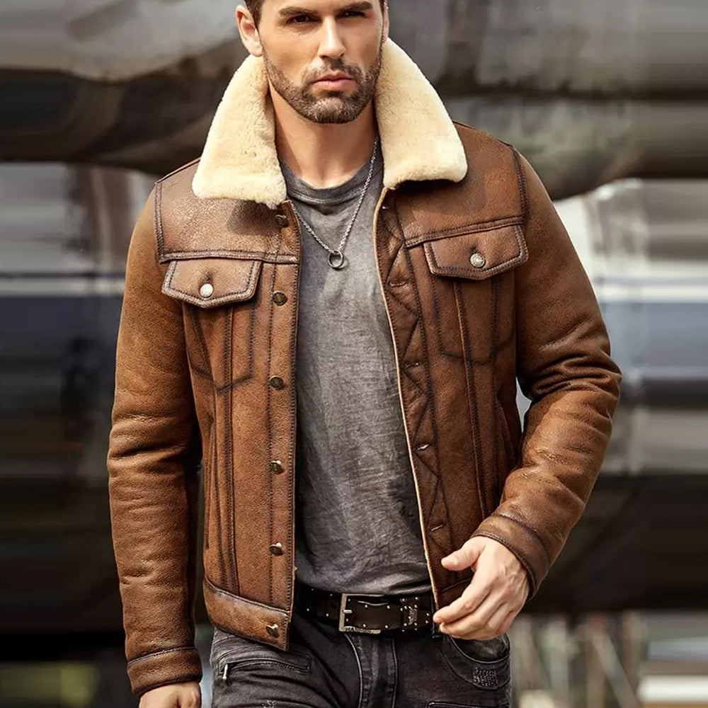 Man wearing a brown leather jacket with a fur collar in an outdoor setting