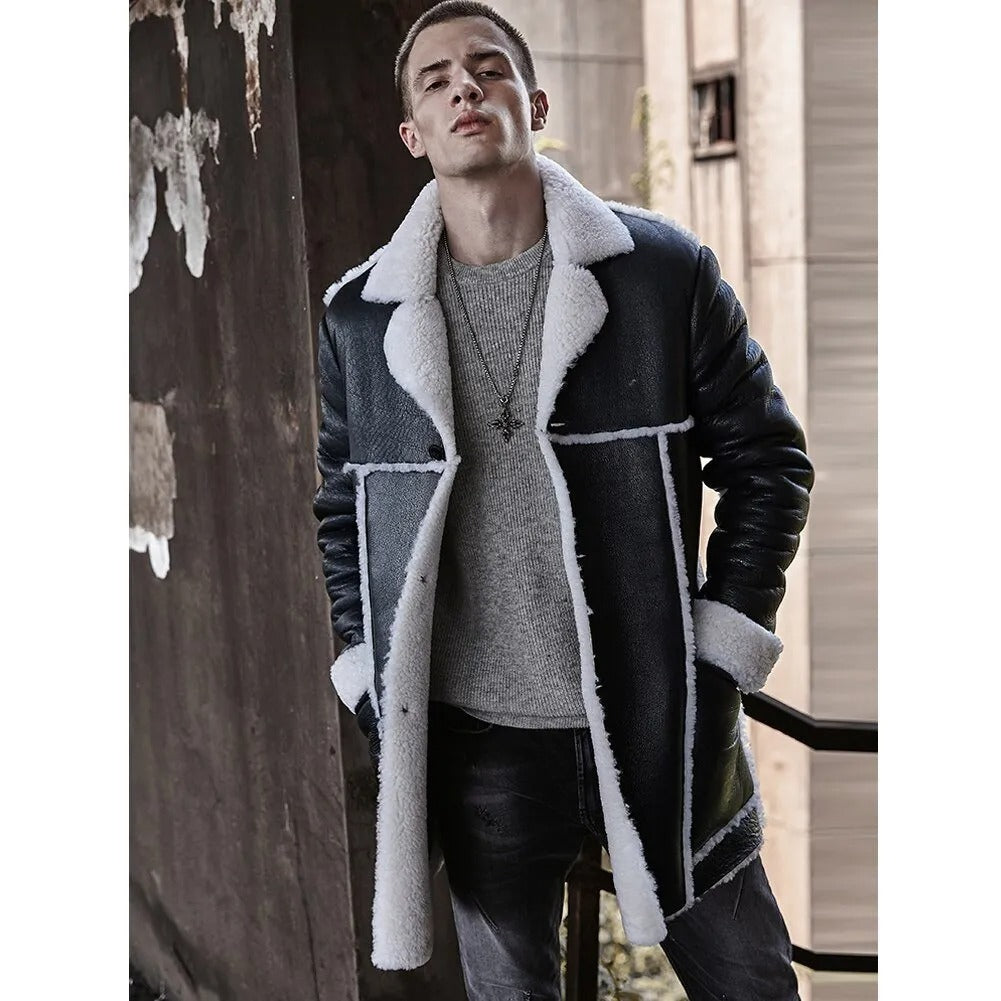 Man wearing a long coat with white fur lining in an urban setting