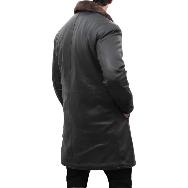 Dark coat with fur collar on a white background