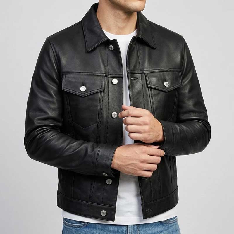 Person wearing a black leather jacket on a gray background