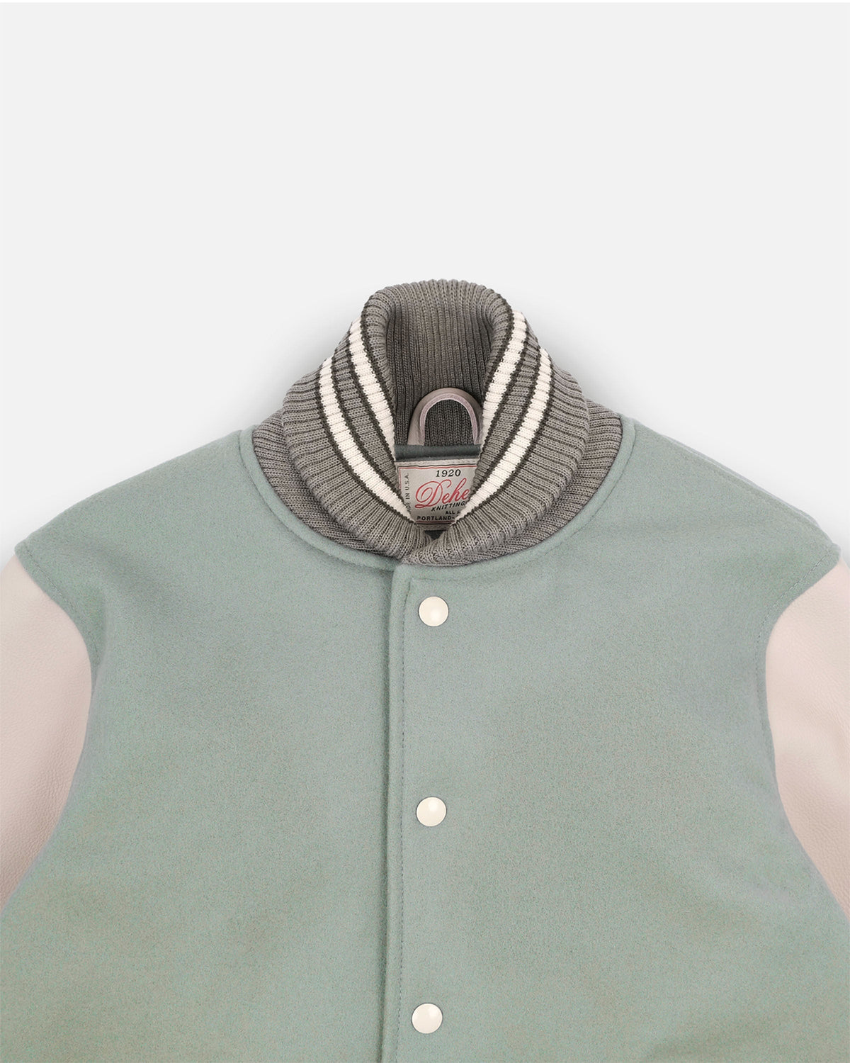 Light green vest with a gray collar on a white background