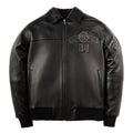 A black leather jacket with a front zipper, ribbed knit collar, cuffs, and hem. The left chest features a debossed graphic with the text 'Hard To Find Rock' and '1978'.