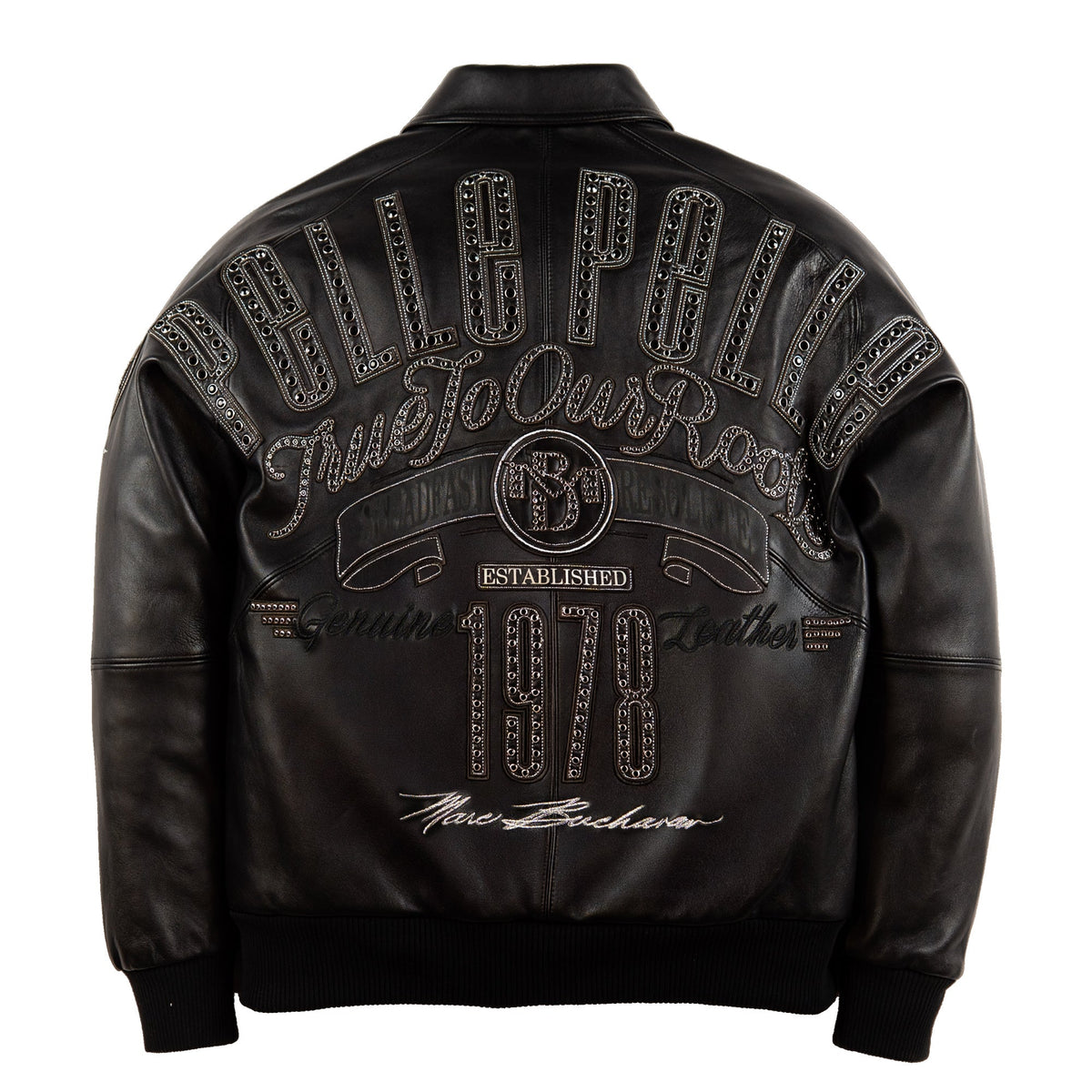 Black leather jacket shown from the back, featuring a large decorative graphic with the words 'PELLE PELLE', 'TRUE To Our Roots', 'Established 1978', and 'New Bachelors' embellished with rhinestone-like detailing, on a white background.