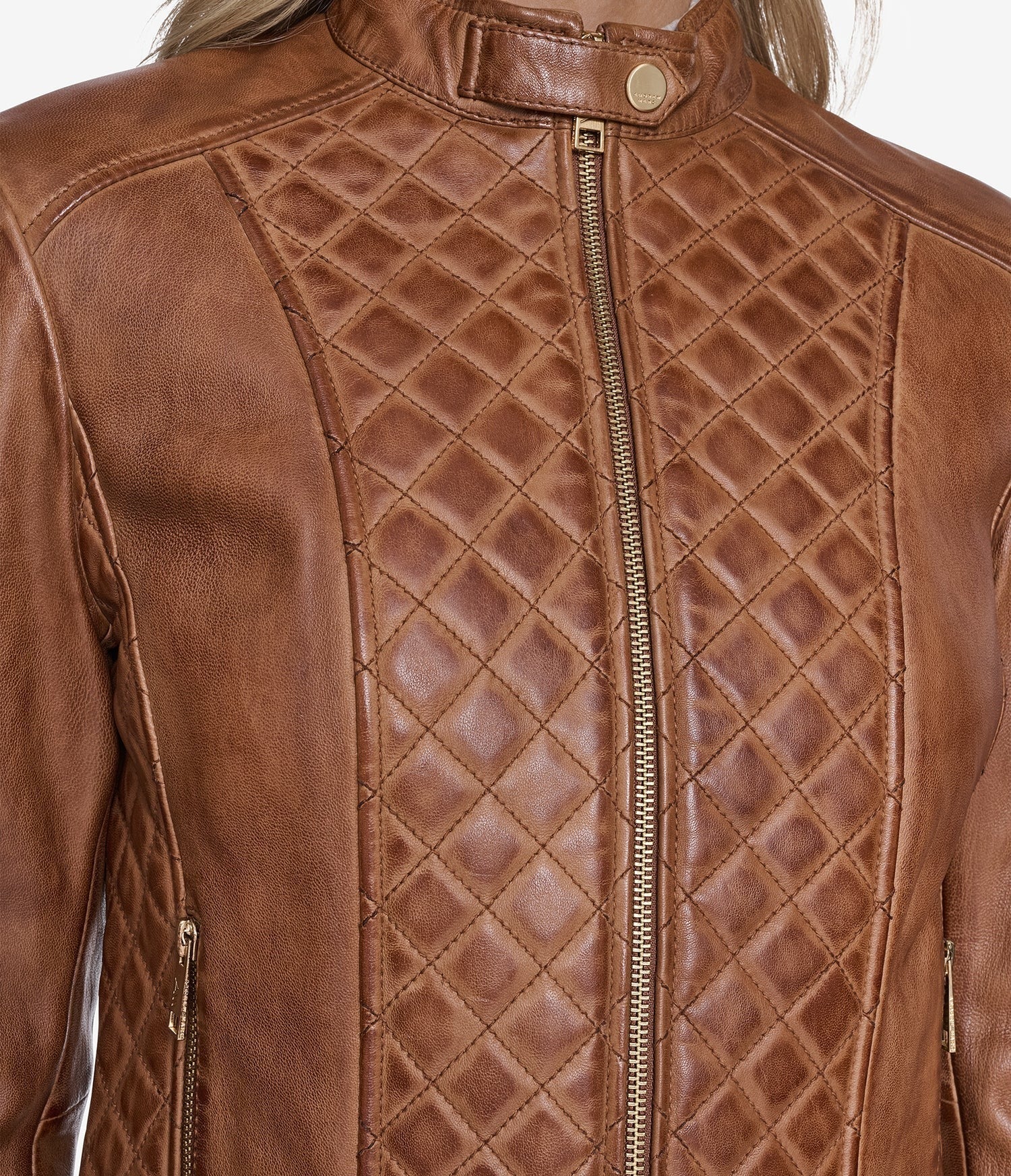 Brown leather jacket with quilted back design
