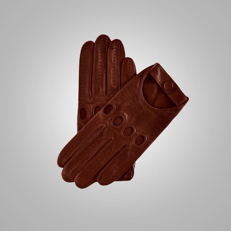 Pair of brown leather gloves on a light gray background