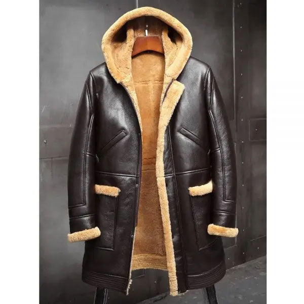 Brown leather coat with beige fur lining on a dark background