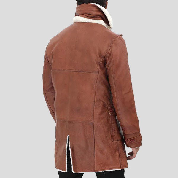Brown leather coat with white fur lining on a gray background