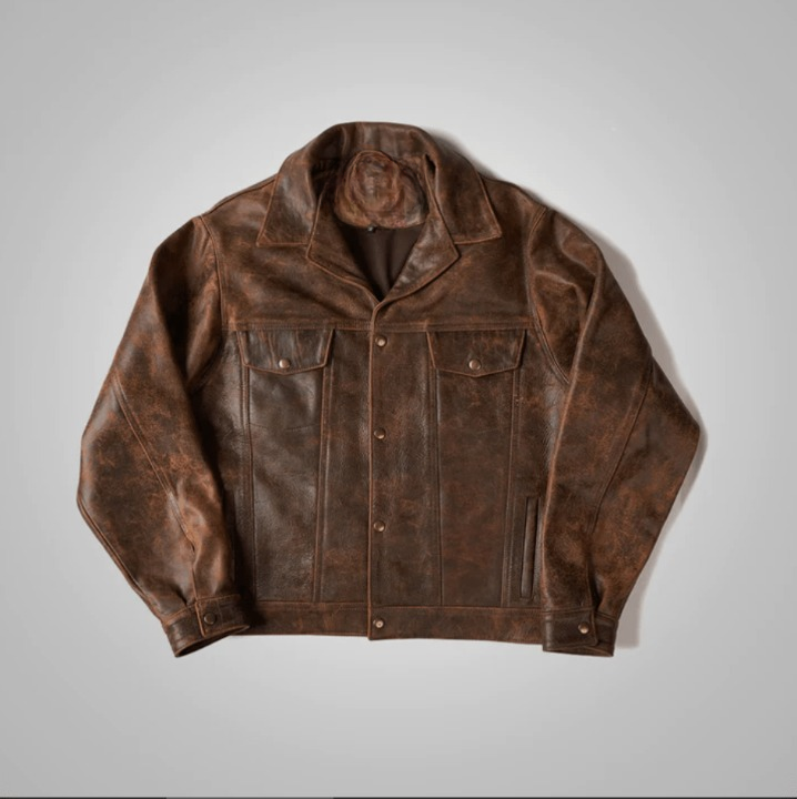 Brown leather jacket on a light gray background