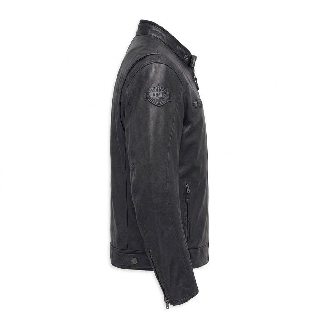 A black leather motorcycle jacket shown from a side profile view against a plain white background, featuring a Harley-Davidson logo patch on the upper sleeve.