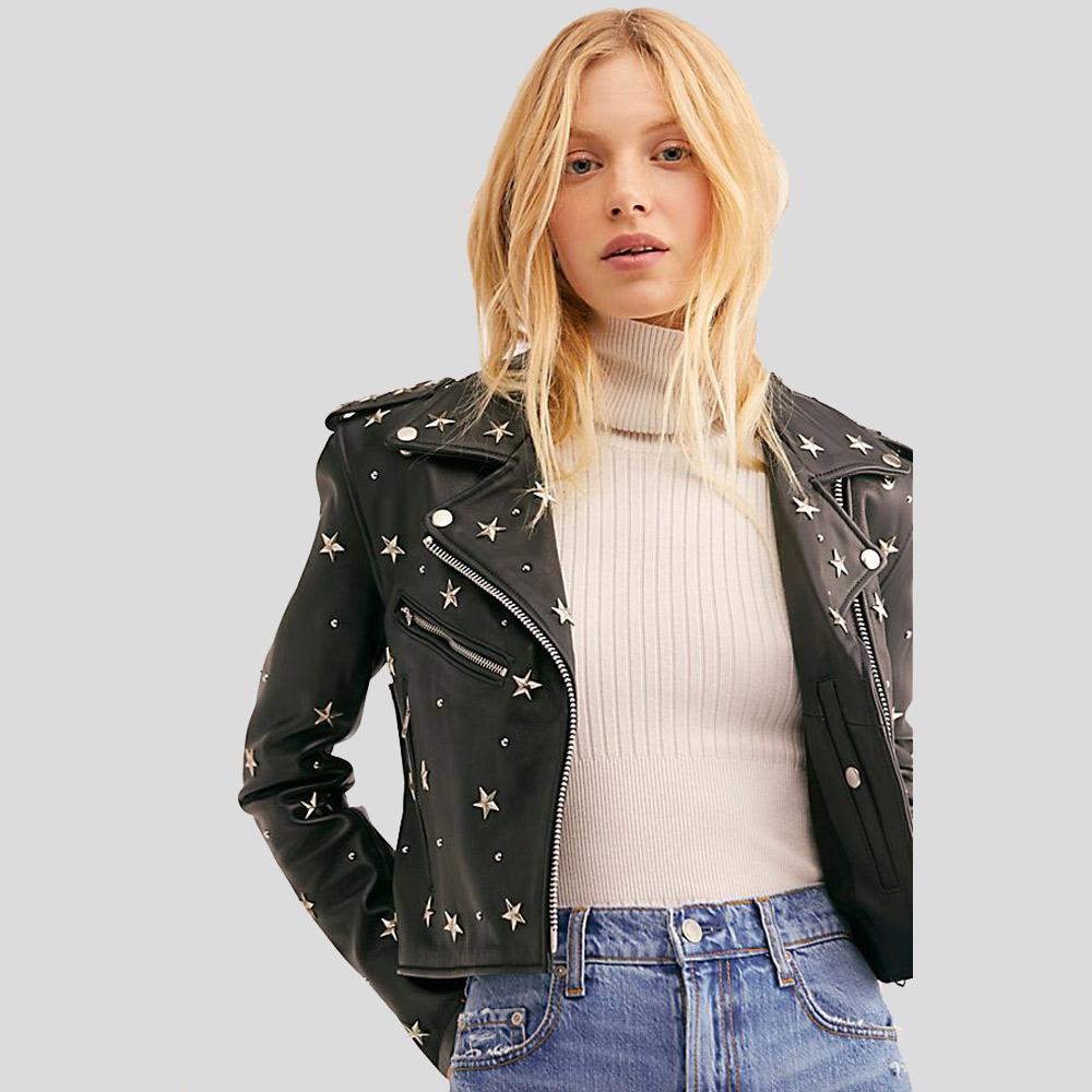 Woman wearing a black leather jacket with star patterns on a light gray background