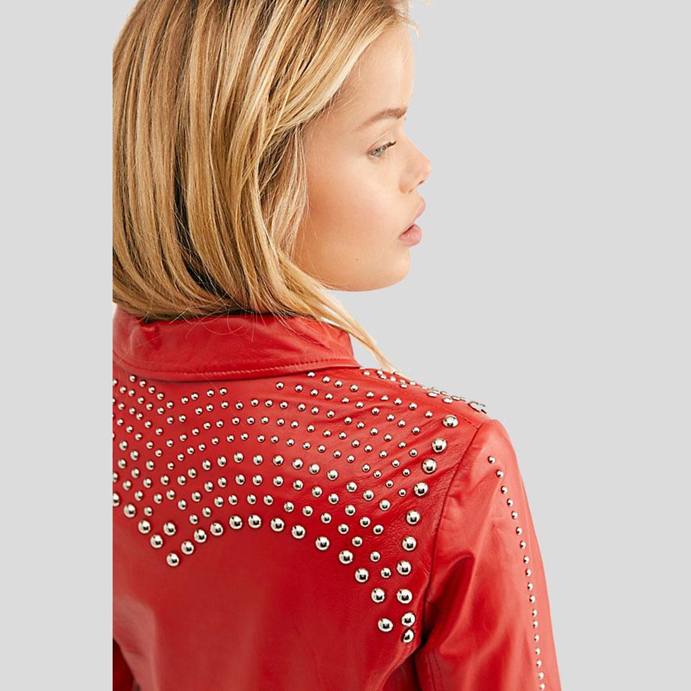 Red studded jacket worn by a person on a light gray background