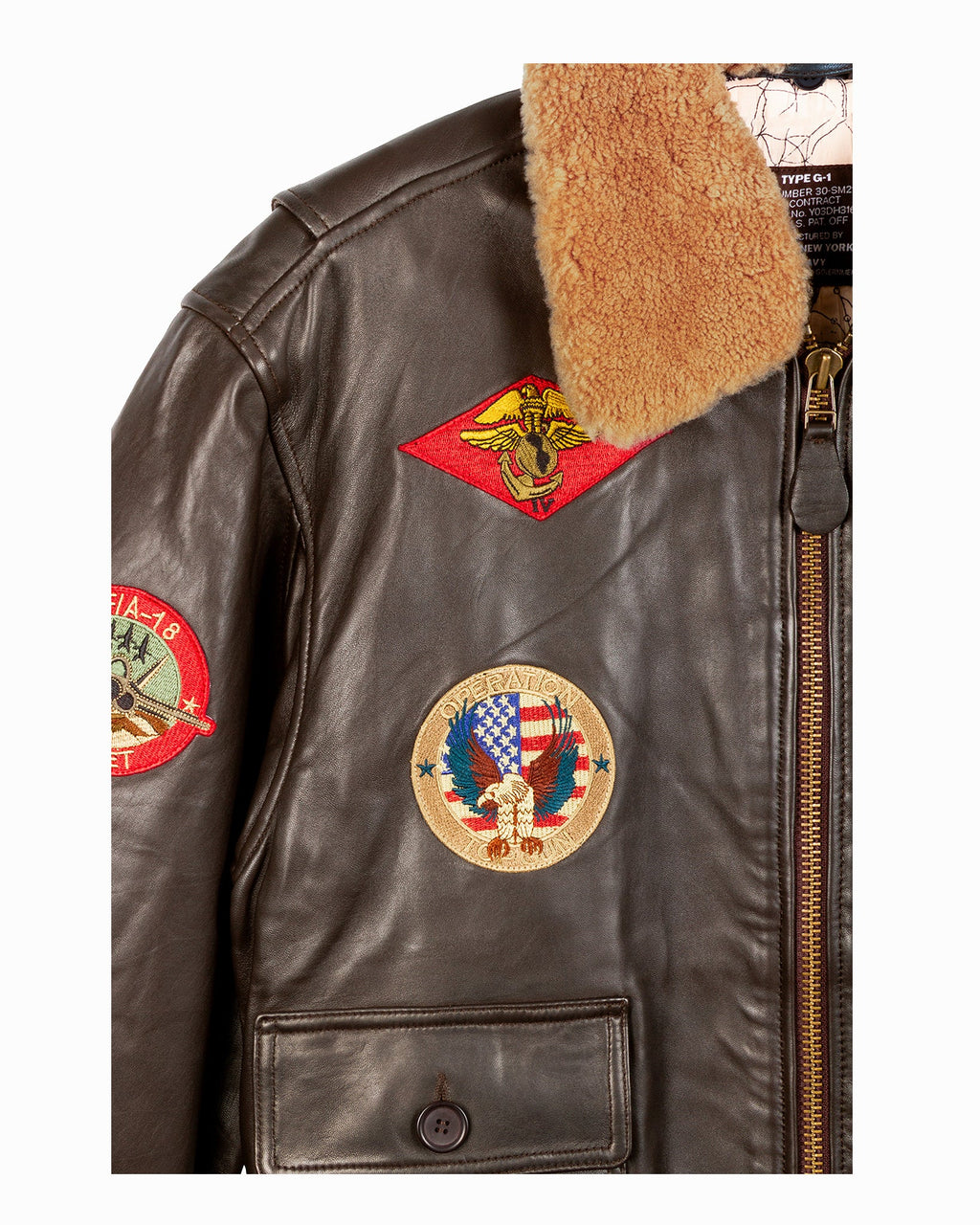 Brown leather jacket with patches on a white background