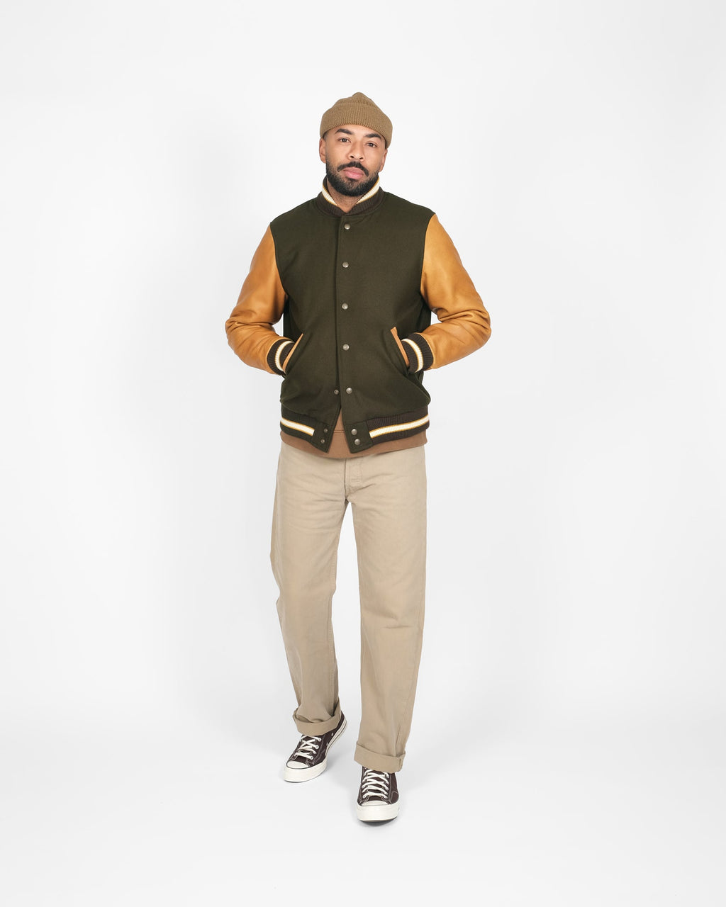 model wearing varsity jacket