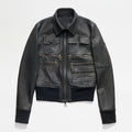 Black leather jacket with multiple pockets and zippers on a white background