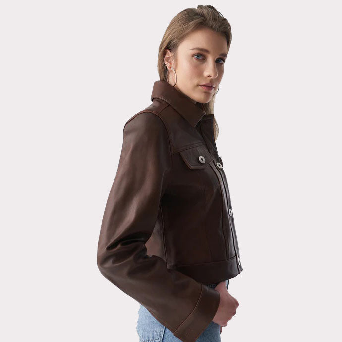 Woman wearing a brown jacket on a white background